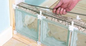 Glass block spacer